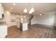 Kitchen with island and stainless steel appliances at 68 Northwood Dr, Fuquay Varina, NC 27526