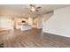 Open living space with hardwood floors and kitchen views at 68 Northwood Dr, Fuquay Varina, NC 27526