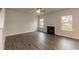 Spacious living room with fireplace and hardwood floors at 68 Northwood Dr, Fuquay Varina, NC 27526