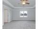 Spacious main bedroom with ceiling fan and window views at 68 Northwood Dr, Fuquay Varina, NC 27526
