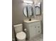 Clean bathroom with white vanity and modern fixtures at 807 W Trinity Ave # 209, Durham, NC 27701