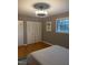 Bright bedroom with double closets and wood flooring at 807 W Trinity Ave # 209, Durham, NC 27701