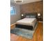 Spacious bedroom with wood floors and a neutral color palette at 807 W Trinity Ave # 209, Durham, NC 27701
