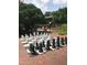 Relaxing pool area with lounge chairs and tables at 807 W Trinity Ave # 209, Durham, NC 27701