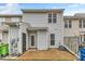 Townhouse backyard with patio, storage shed, and fence at 9009 Grassington Way, Raleigh, NC 27615