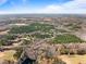 Aerial view of a large, wooded property near a road at 2001 Wheelers Church Rd Rd, Hurdle Mills, NC 27541