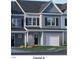 Two-story townhome with gray siding and white trim at 2203 Carcillar Dr, Apex, NC 27539