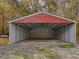 Detached metal garage with red roof and side walls at 3010 Mcdade Store Rd, Cedar Grove, NC 27231