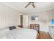 Bright bedroom with wood floors and ceiling fan at 4022 Neal Rd, Durham, NC 27705