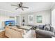 Living room with comfy sofas and large TV at 4022 Neal Rd, Durham, NC 27705