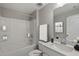 Clean bathroom with shower/tub combo and updated vanity at 72 Macy Circle, Wendell, NC 27591