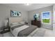 Bright bedroom with large window and ample closet space at 72 Macy Circle, Wendell, NC 27591