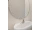 Clean bathroom with an oval sink and a large mirror at 900 Canis Minor Rd, Wendell, NC 27591