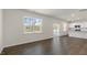 Bright dining area with wood flooring and patio access at 900 Canis Minor Rd, Wendell, NC 27591