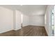 Spacious living room with hardwood floors and access to backyard at 900 Canis Minor Rd, Wendell, NC 27591