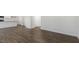 Spacious living room featuring hardwood floors and access to the kitchen at 900 Canis Minor Rd, Wendell, NC 27591