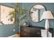 Bedroom with a dresser and large mirror, decorated in calming neutrals at 928 Canis Minor Rd, Wendell, NC 27591