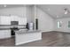 White cabinets, granite countertops, and stainless steel appliances at 11300 International Dr, Middlesex, NC 27557