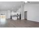 Open concept kitchen with island and stainless steel appliances at 11300 International Dr, Middlesex, NC 27557