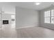 Bright dining room with hardwood floors and large windows at 210 Palace Green Ln, Sanford, NC 27330