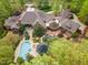 Luxury home with pool and extensive landscaping on a wooded lot at 32520 Archdale Dr, Chapel Hill, NC 27517