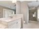 Bathroom with white vanity, shower, and tile floors at 32520 Archdale Dr, Chapel Hill, NC 27517