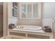 Bathroom with jetted tub and double vanities at 32520 Archdale Dr, Chapel Hill, NC 27517