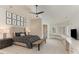 Bright bedroom with a king-size bed and bay window at 32520 Archdale Dr, Chapel Hill, NC 27517