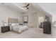 Bright bedroom with carpeted floors and large windows at 32520 Archdale Dr, Chapel Hill, NC 27517