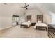 Spacious bedroom with two twin beds and window seating at 32520 Archdale Dr, Chapel Hill, NC 27517