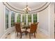 Breakfast nook with a round table and chairs, offering natural light at 32520 Archdale Dr, Chapel Hill, NC 27517
