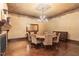 Elegant dining room with a large table and chandelier at 32520 Archdale Dr, Chapel Hill, NC 27517