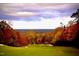 Stunning autumn view of a golf course at 32520 Archdale Dr, Chapel Hill, NC 27517