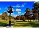 Ornate clock overlooking the golf course at 32520 Archdale Dr, Chapel Hill, NC 27517