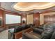 Upscale home theater with large screen and luxurious seating at 32520 Archdale Dr, Chapel Hill, NC 27517