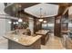 Large kitchen features a sizable island with seating and stainless steel appliances at 32520 Archdale Dr, Chapel Hill, NC 27517