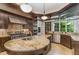 Modern kitchen with granite countertops, stainless steel appliances, and a large island at 32520 Archdale Dr, Chapel Hill, NC 27517