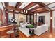 Elegant living room featuring hardwood floors, a fireplace, and ample seating at 32520 Archdale Dr, Chapel Hill, NC 27517