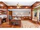 Home office with built-in bookcases and a large desk at 32520 Archdale Dr, Chapel Hill, NC 27517
