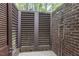Private outdoor shower with privacy screen at 32520 Archdale Dr, Chapel Hill, NC 27517