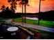 Enjoy sunset views from this patio overlooking the golf course at 32520 Archdale Dr, Chapel Hill, NC 27517
