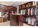 Large walk-in closet with ample shelving and hanging space at 32520 Archdale Dr, Chapel Hill, NC 27517