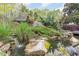 Serene water feature with waterfall and pond at 32520 Archdale Dr, Chapel Hill, NC 27517