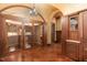 Custom wine cellar with glass doors and extensive storage at 32520 Archdale Dr, Chapel Hill, NC 27517