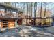 Multi-level deck and garage with wooden details at 501 Spring Valley Dr, Raleigh, NC 27609