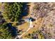 Aerial view of house, detached shed, and garden at 5368 Hoover Dr, Burlington, NC 27217