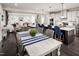 Open concept dining room with farmhouse table and view into Gathering room at 604 Mohinda Way, Willow Springs, NC 27592