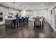 Open concept kitchen with island seating and dining area at 604 Mohinda Way, Willow Springs, NC 27592