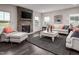 Spacious living room featuring a stone fireplace and comfortable seating at 604 Mohinda Way, Willow Springs, NC 27592