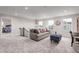Cozy loft area with comfortable seating and a view of a bedroom at 604 Mohinda Way, Willow Springs, NC 27592